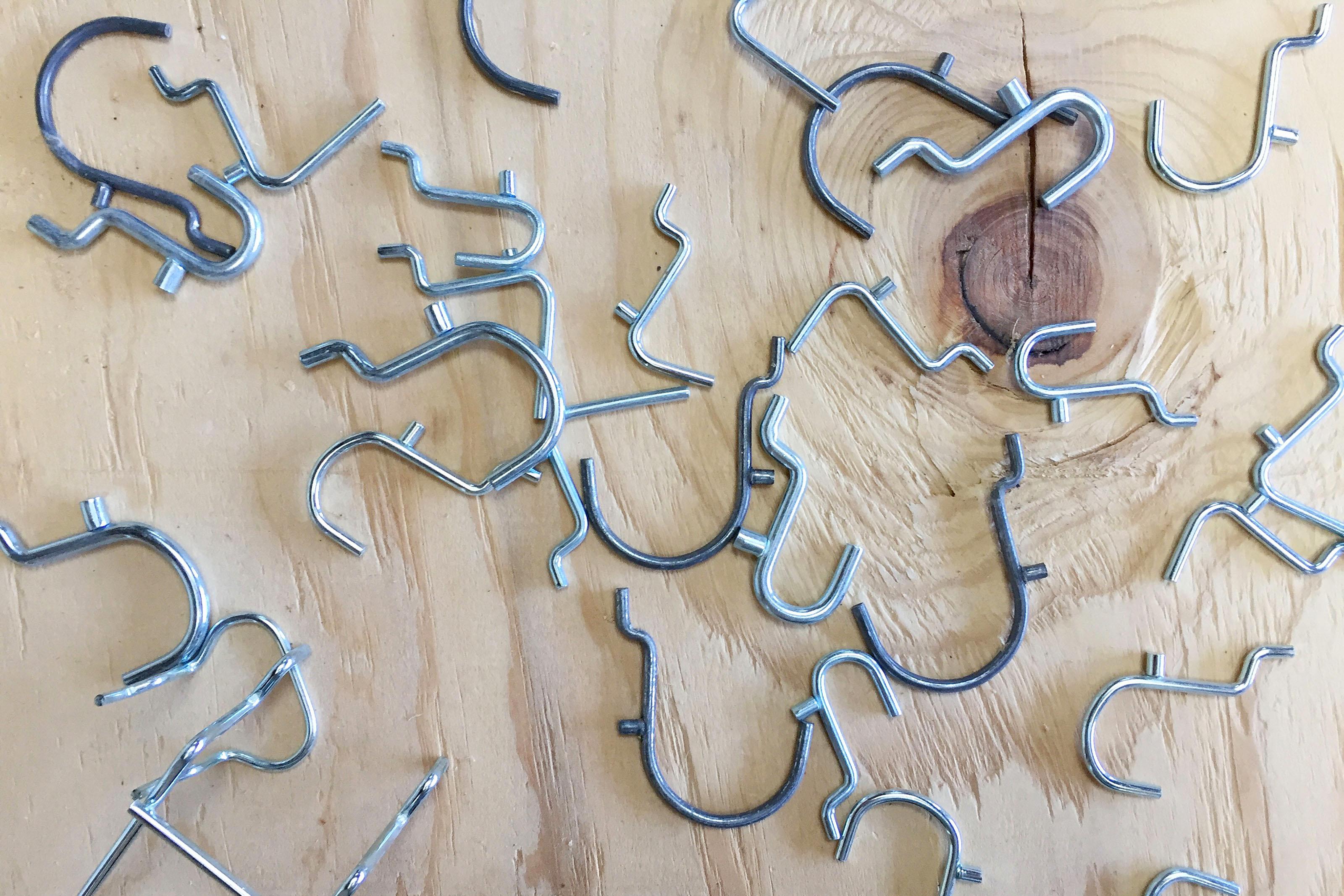 Organizing Made Fun: How to Hide Messy Cords with Pegboard