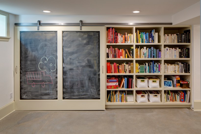 Built-in basement bookshelves for storage
