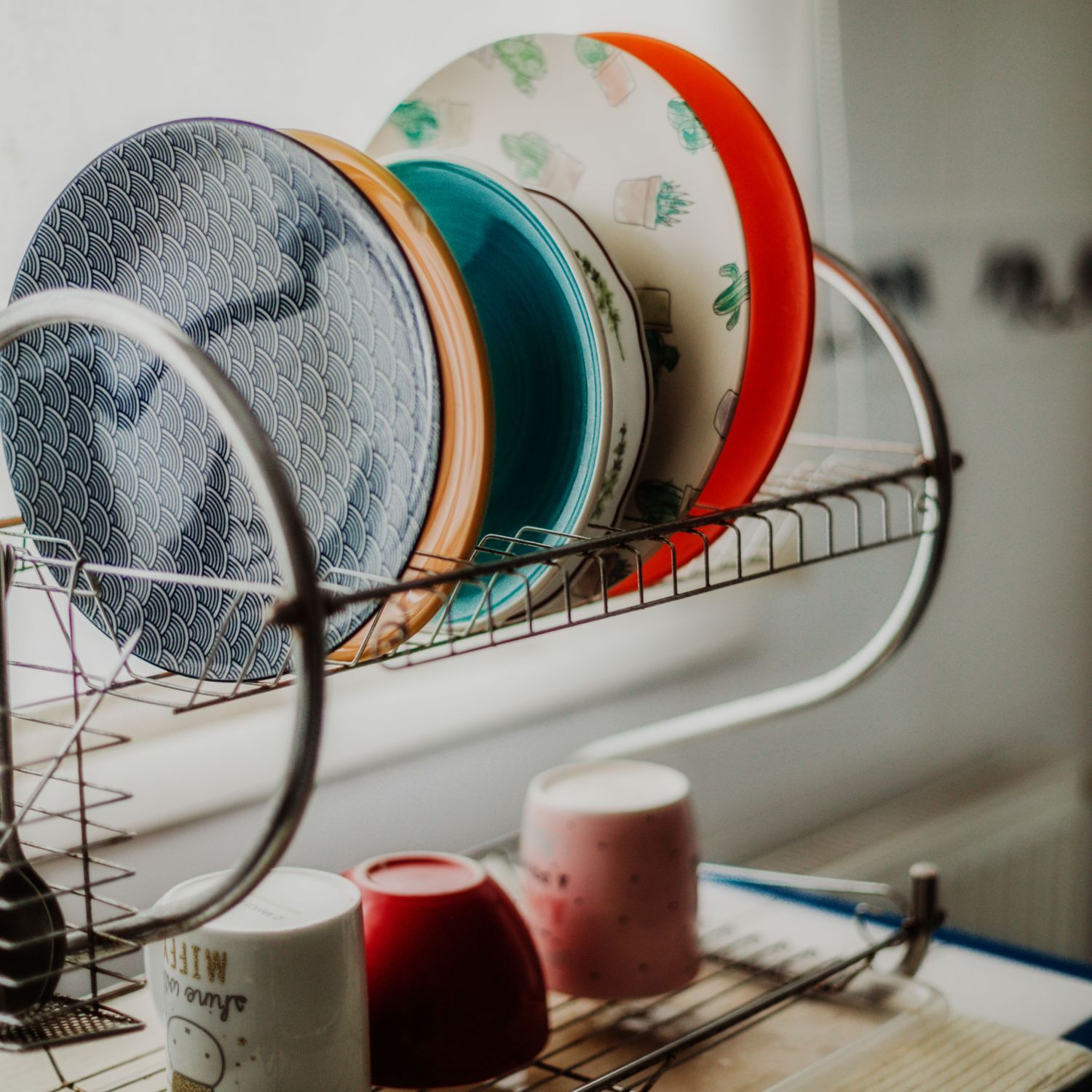 Plates on drying rack in the kitchen