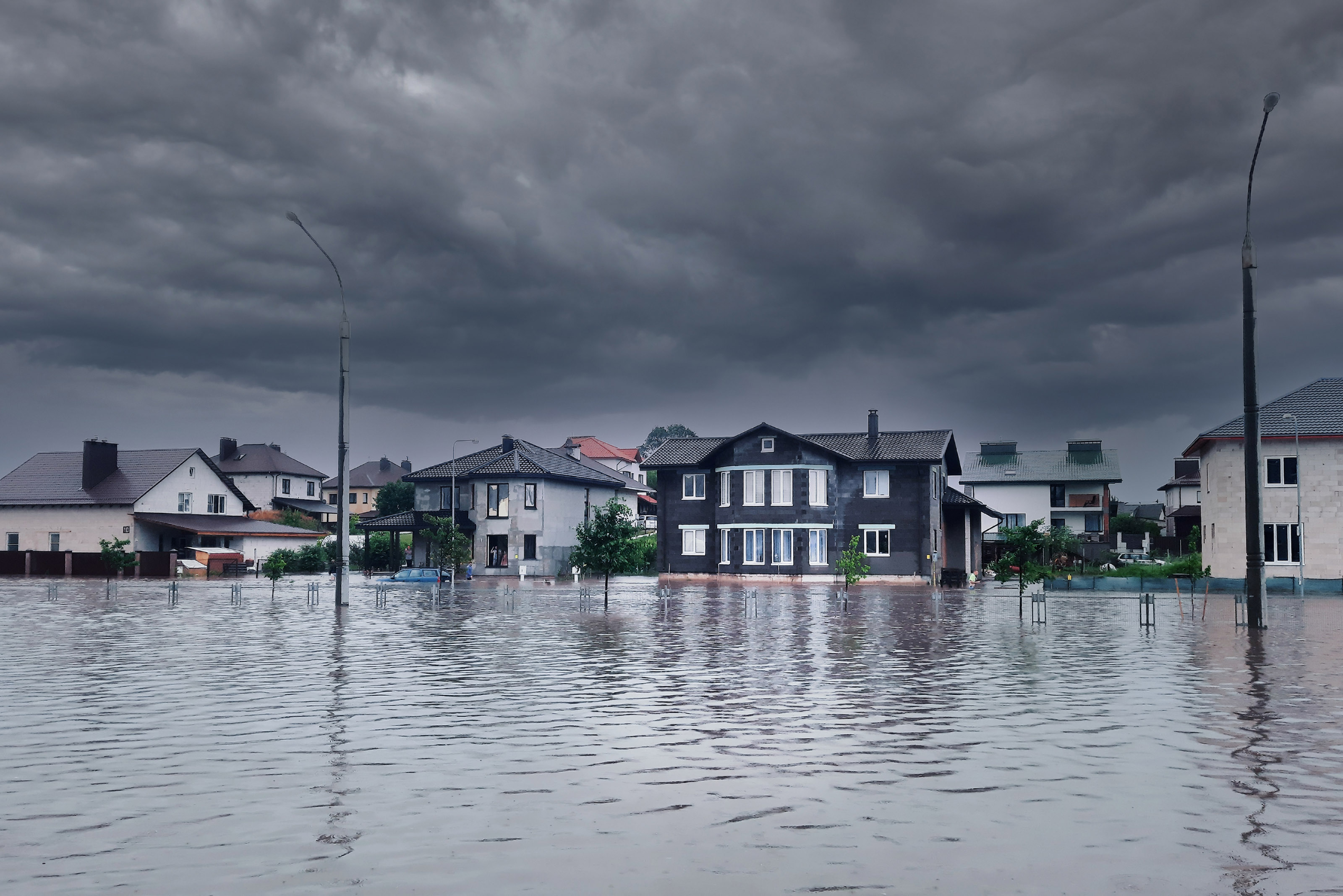 Flooded streets of a neighborhood from heavy rains from a hurricane.