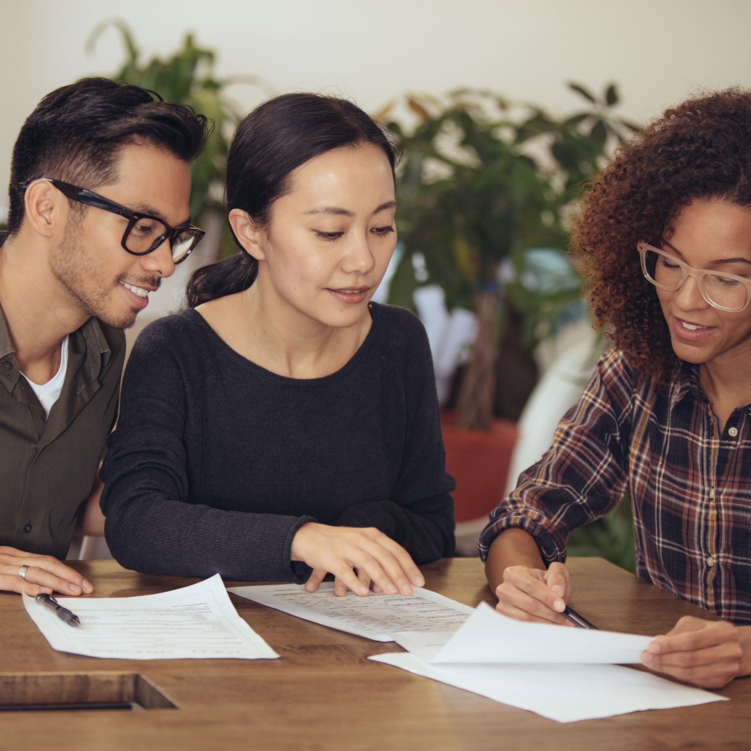 A real estate agent answering questions for prospective homeowners.