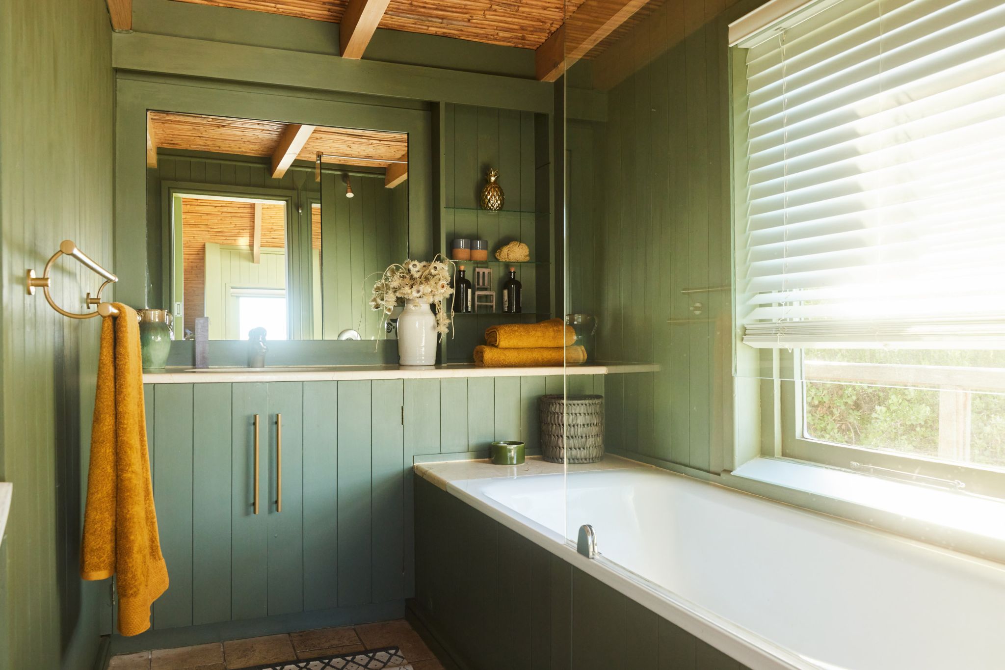 A shot of a bathroom with under-the-sink storage to exemplify 2025 home trends.