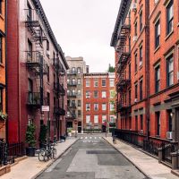 A view of a residential street featuring co-ops, also known as cooperative housing.