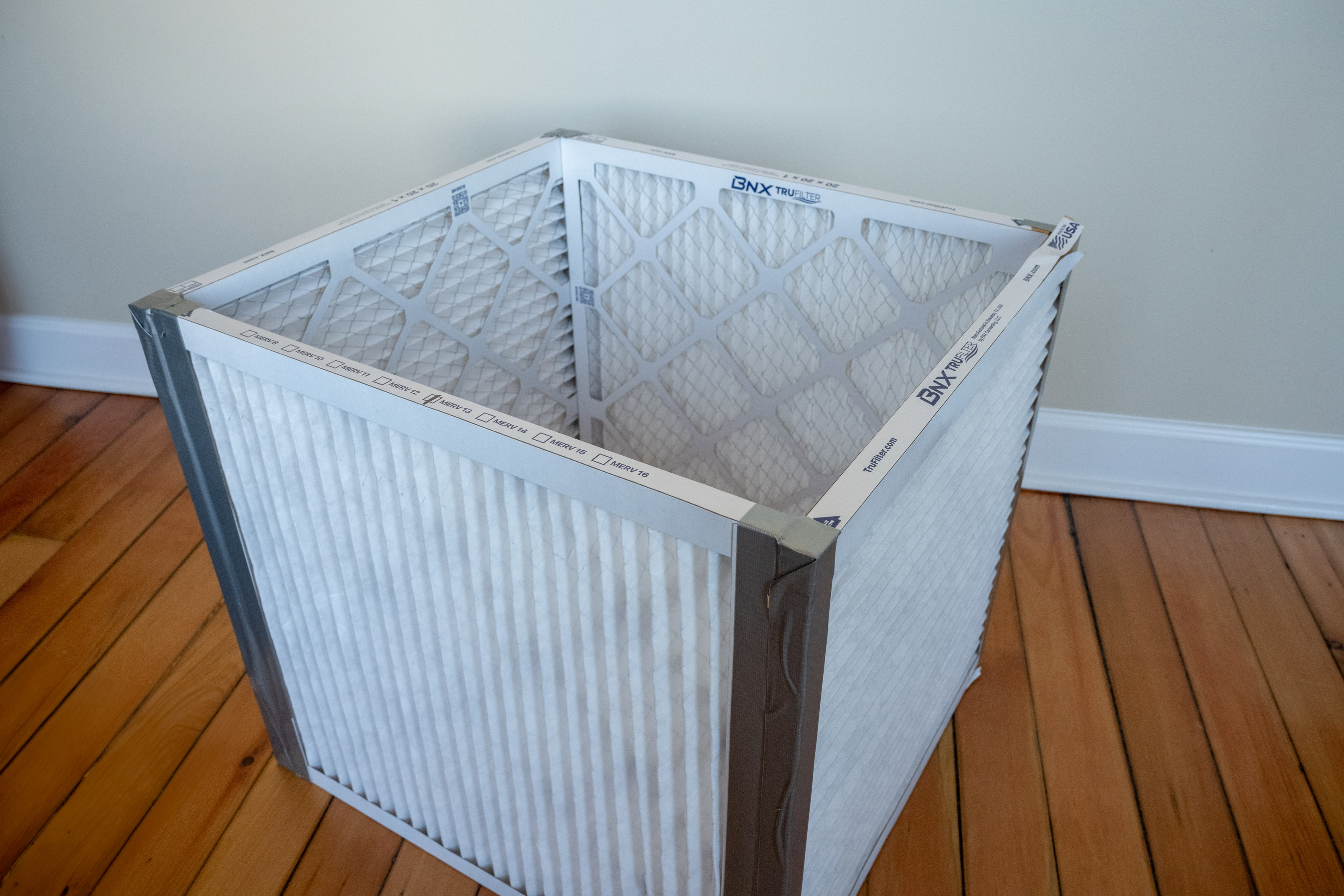 Step 1: Duct tape the air filters together to make a cube. Make sure the arrows marked on the edge of the filters are facing the inside of your cube.