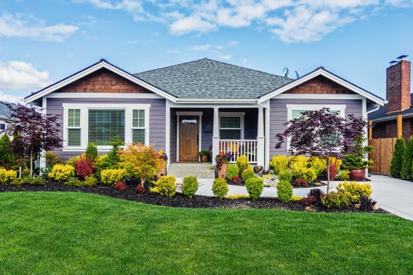 A colorful, modern single-level home exemplifying what can be done with exterior paint.