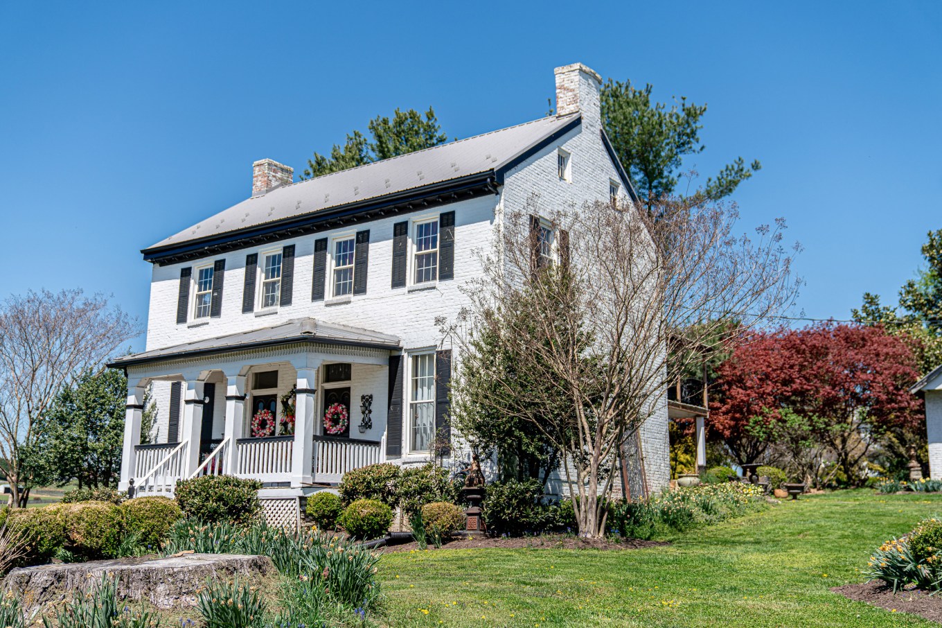 Colonial-Style Brick Ranch Duplex Home USA in the Springtime